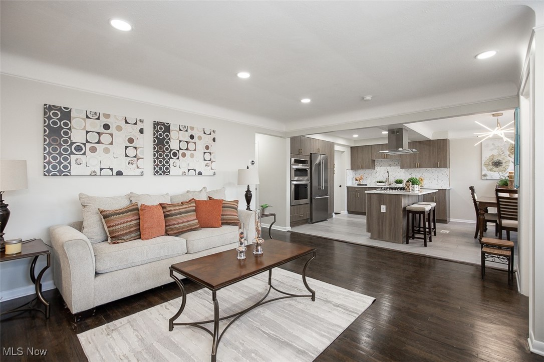 4631 Belfiore Road Cleveland, OH 44128 - Photo 5 of 28 Living area featuring recessed lighting and dark wood-style floors