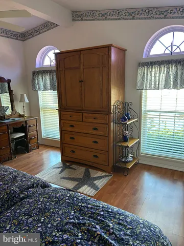 a view of a livingroom with furniture and window