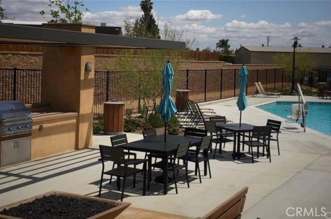 630 Chandler Walk Upland, CA 91786 - Photo 11 of 13 a view of a dinning table and chairs in the patio