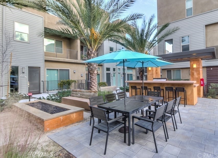 630 Chandler Walk Upland, CA 91786 - Photo 10 of 13 a view of a dinning table and chairs in the patio
