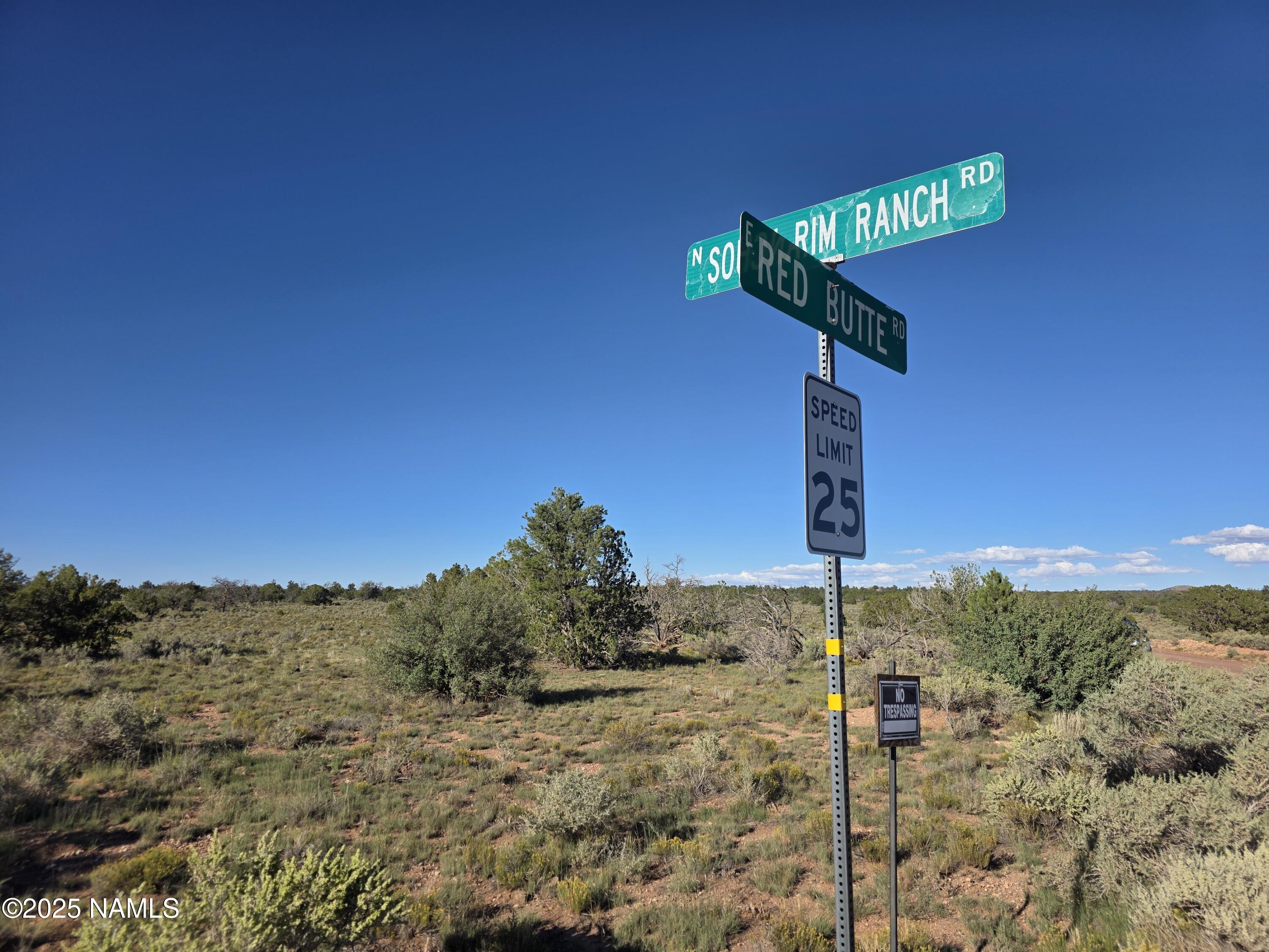 10072 Red Butte Road Williams, AZ 86046 - Photo 7 of 20 a street sign on a pole