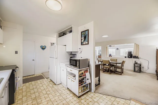 a room with furniture and a flat screen tv