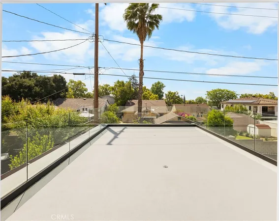 a view of a swimming pool with a yard