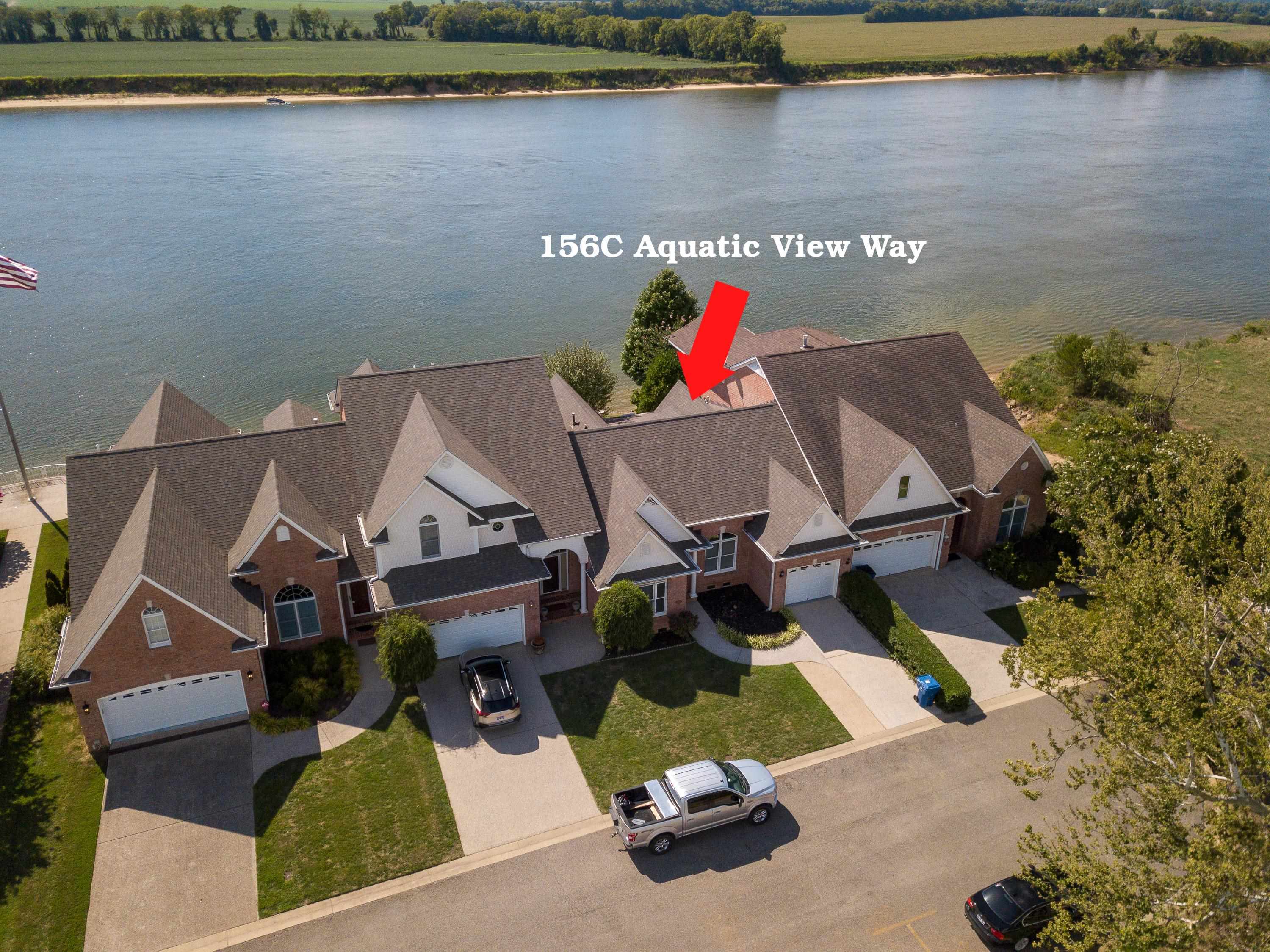 156 C Aquatic View Way Savannah, TN 38372 - Photo 1 of 23 an aerial view of houses with outdoor space