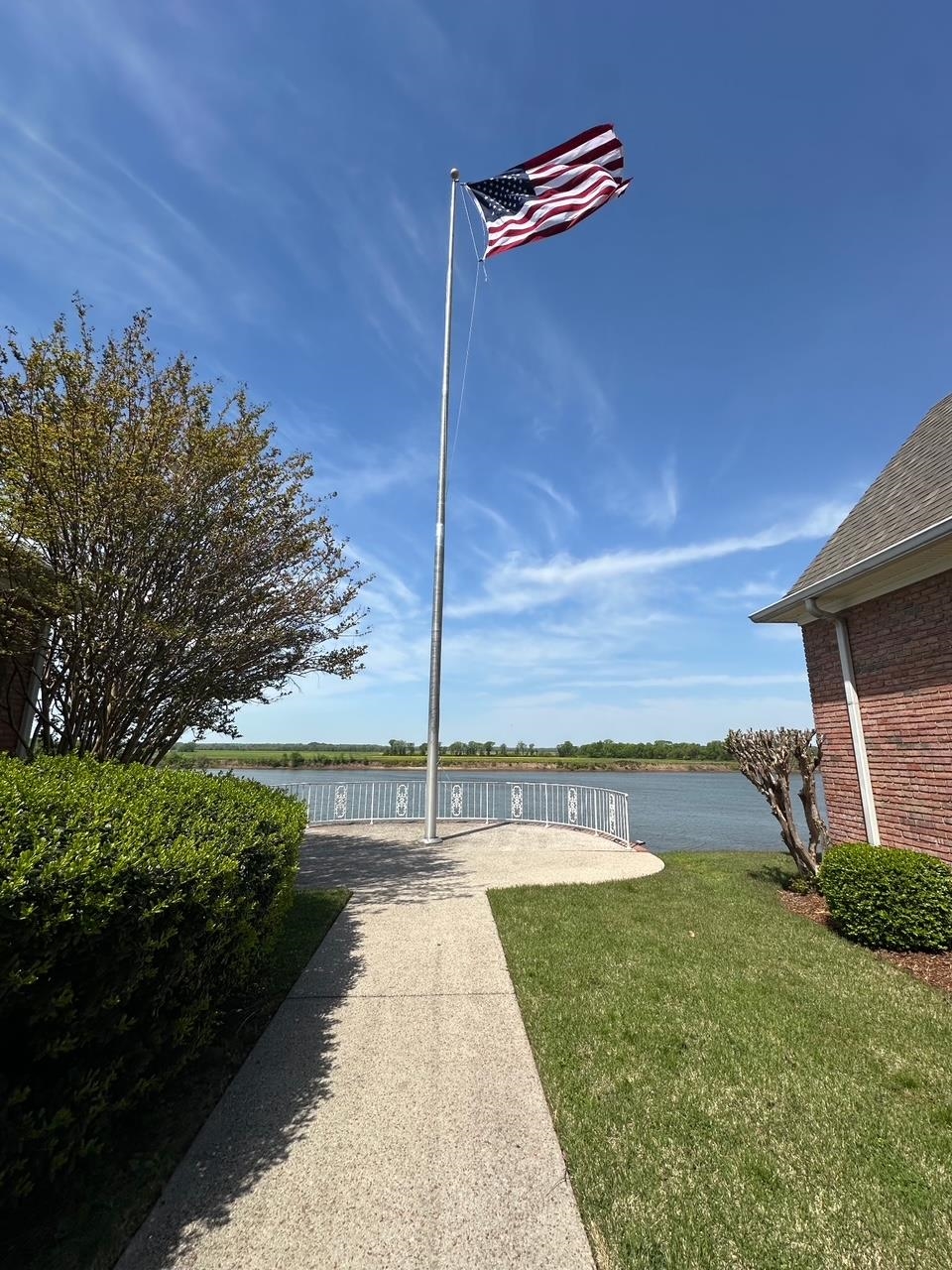 156 C Aquatic View Way Savannah, TN 38372 - Photo 17 of 23 a view of a backyard with sitting area
