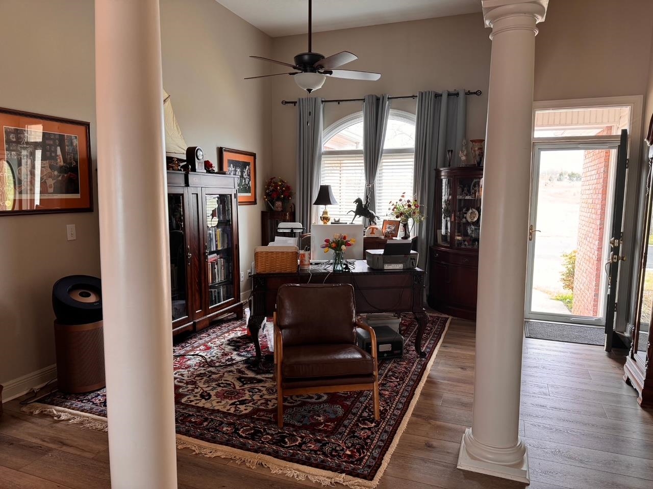 156 C Aquatic View Way Savannah, TN 38372 - Photo 4 of 23 a view of a dining room with furniture window and wooden floor