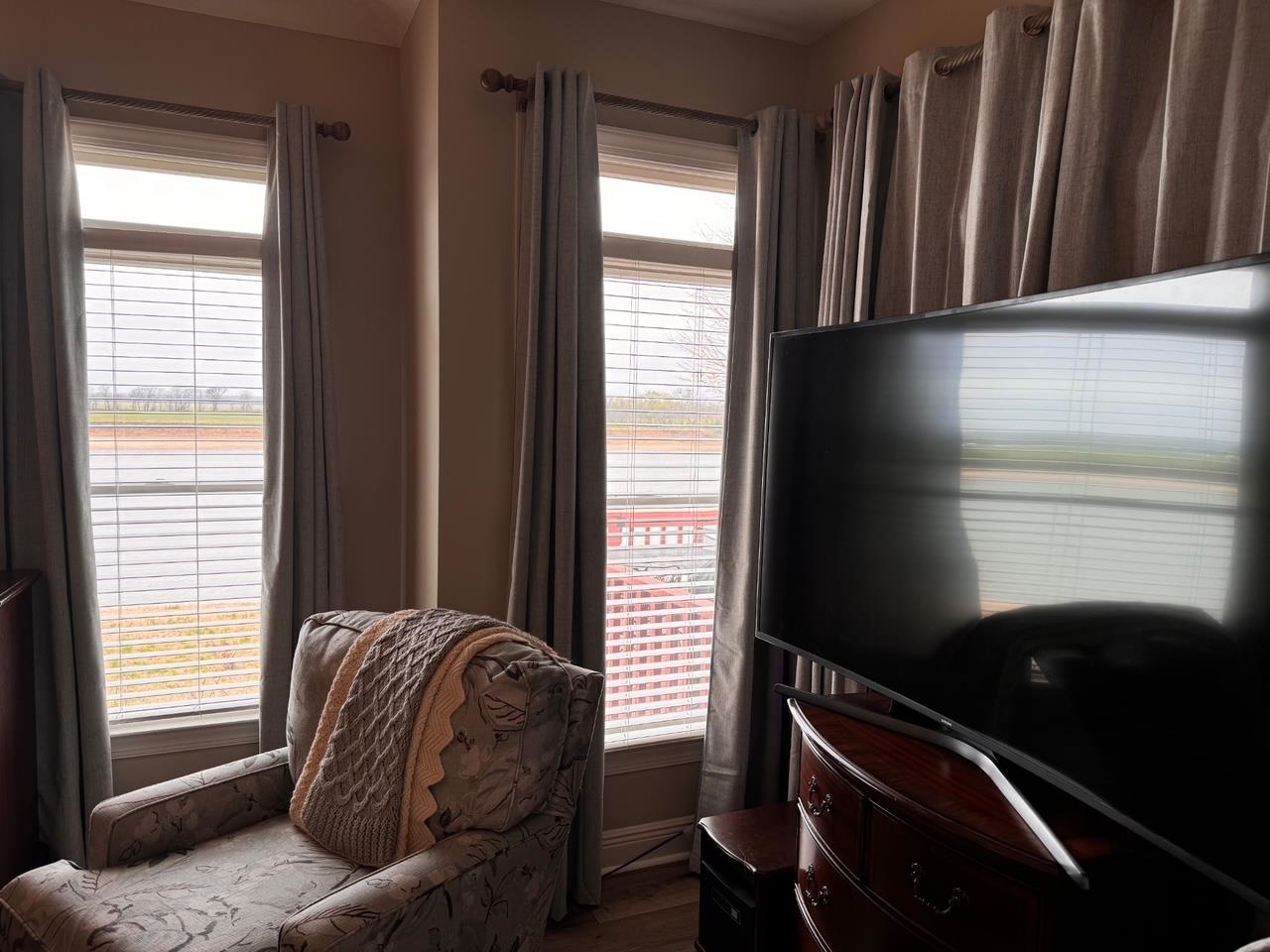 156 C Aquatic View Way Savannah, TN 38372 - Photo 6 of 23 a view of a livingroom with furniture and a window