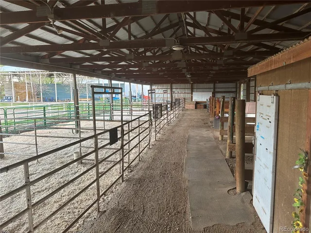 a view of outdoor space with wooden fence