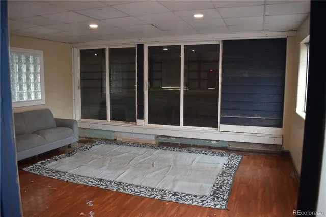 a view of balcony and wooden floor