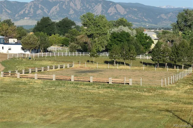 a view of an empty room with glass door
