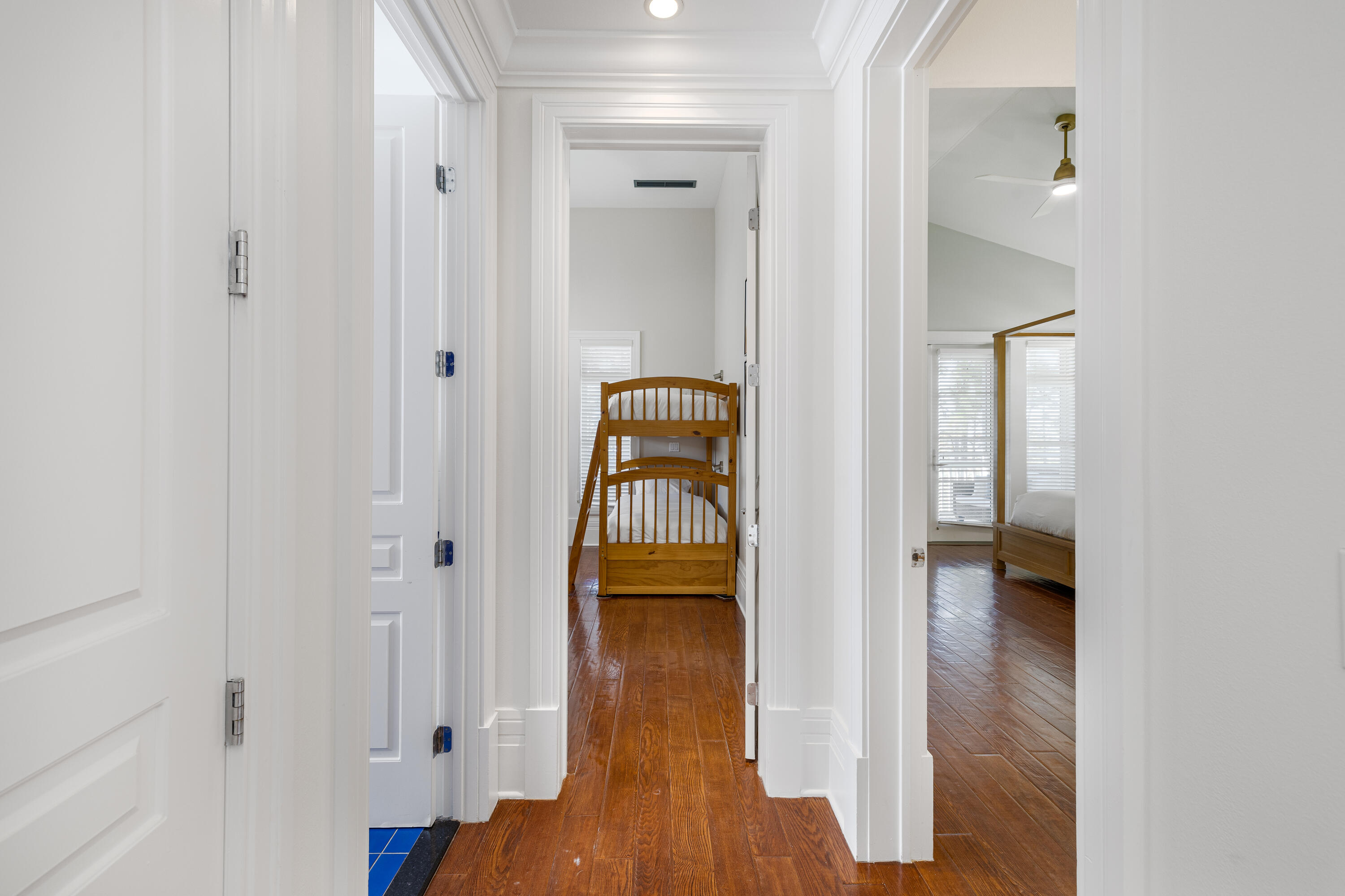 8115 Inspiration Drive, Unit C2 Sandestin, FL 32550 - Photo 22 of 44 wooden floor in a gallery