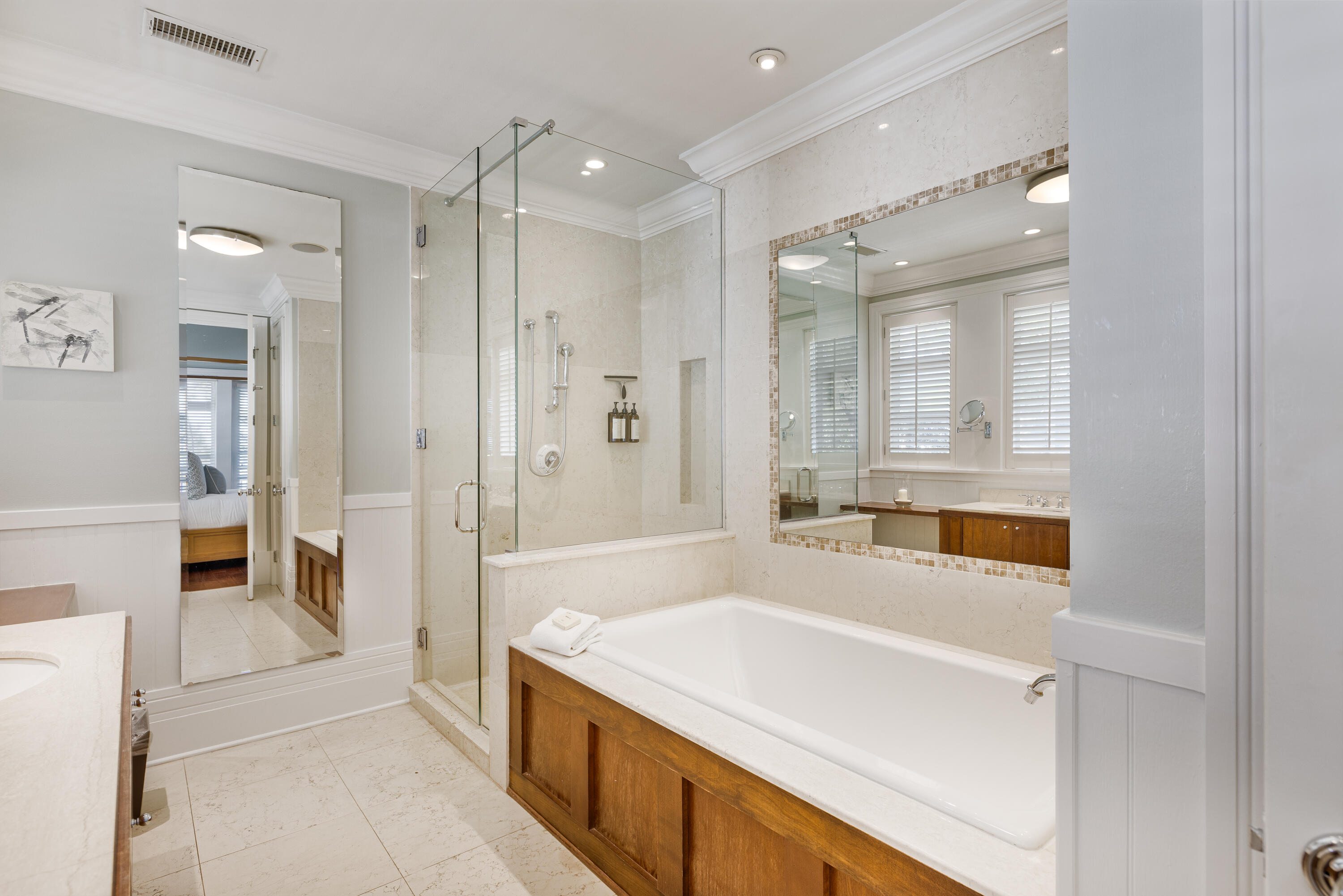 8115 Inspiration Drive, Unit C2 Sandestin, FL 32550 - Photo 30 of 44 a spacious bathroom with a tub shower and sink