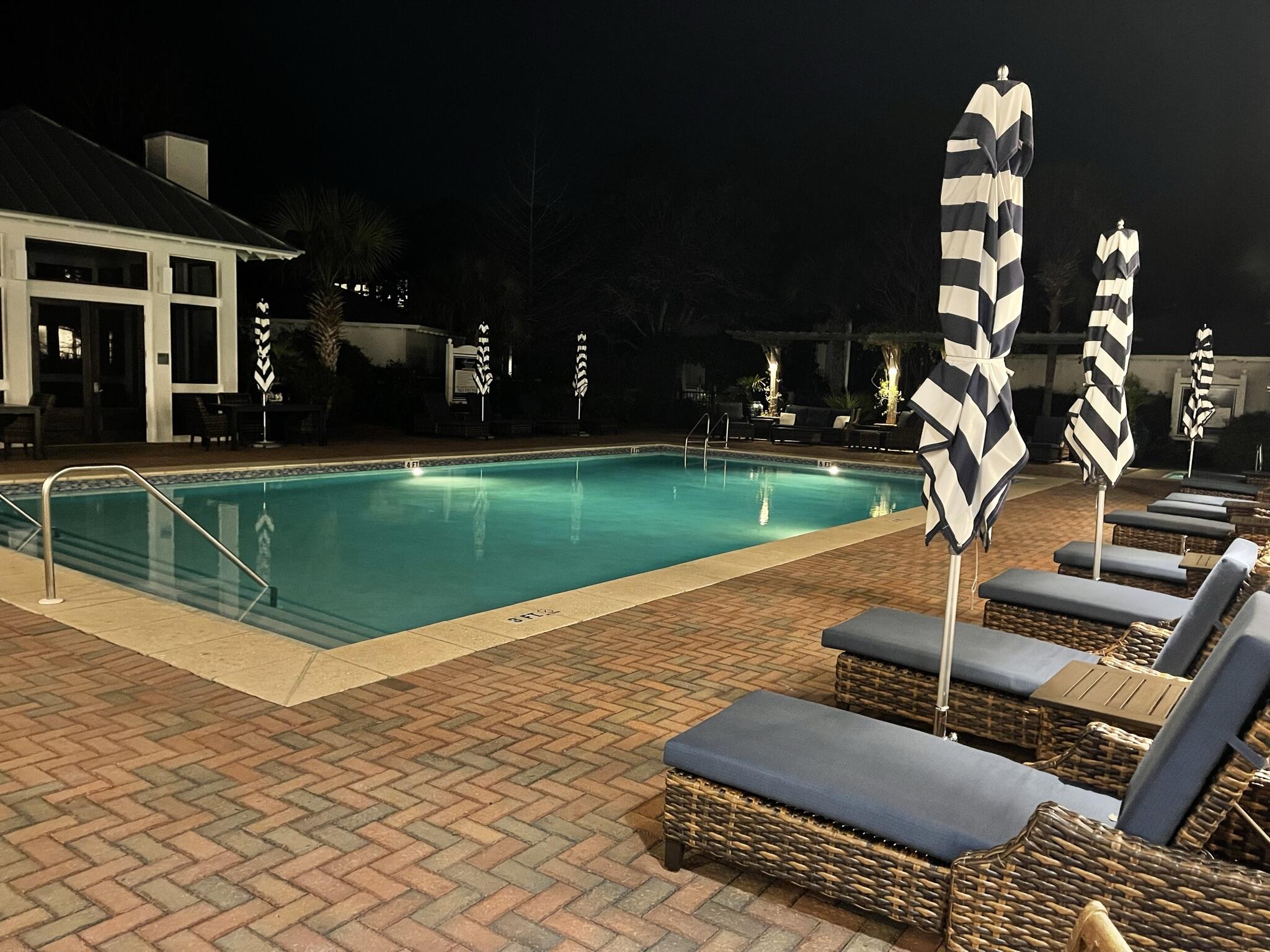 8115 Inspiration Drive, Unit C2 Sandestin, FL 32550 - Photo 35 of 44 a view of a patio with a yard