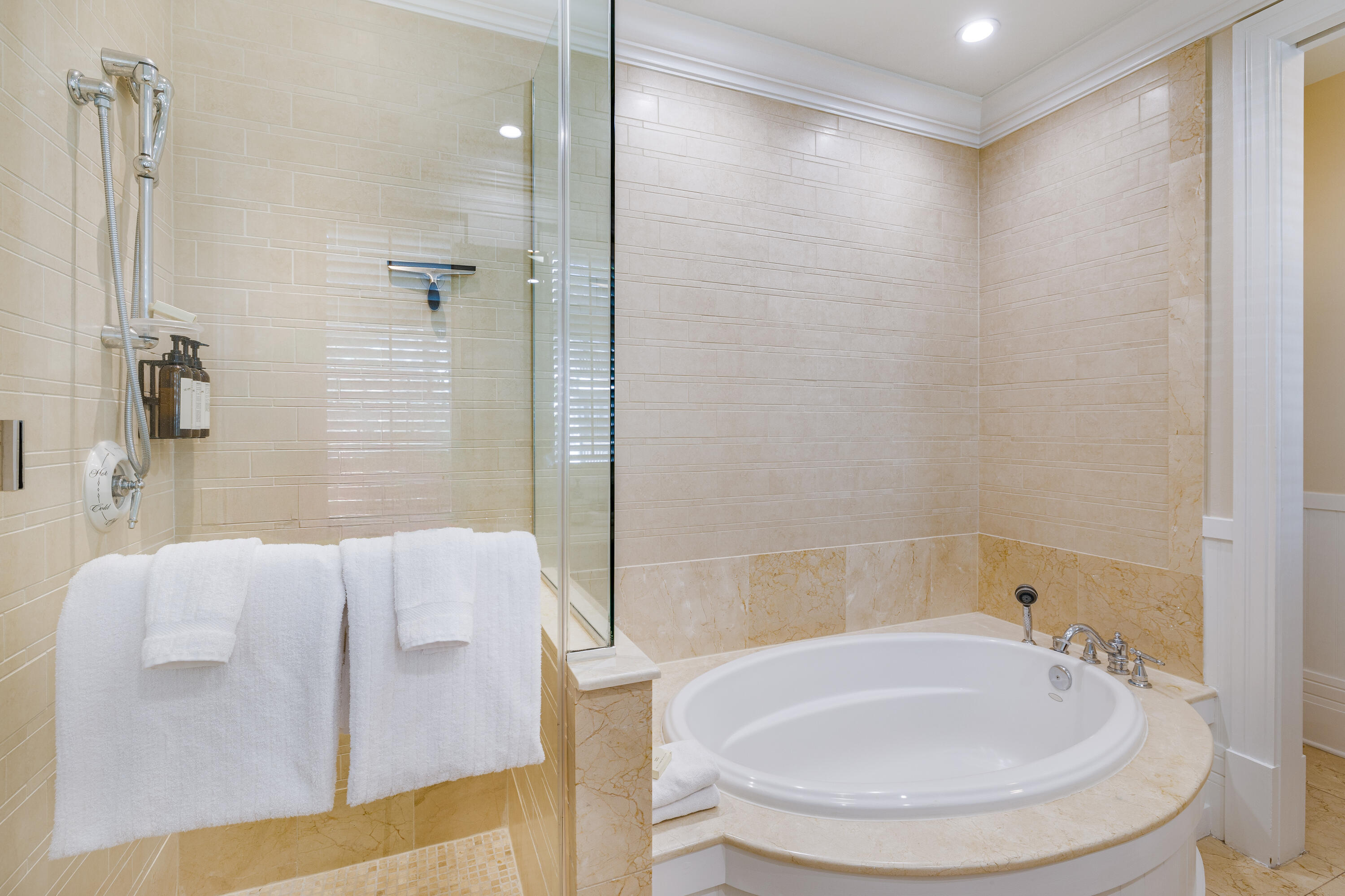 8115 Inspiration Drive, Unit C2 Sandestin, FL 32550 - Photo 7 of 44 a bathroom with a tub and sink