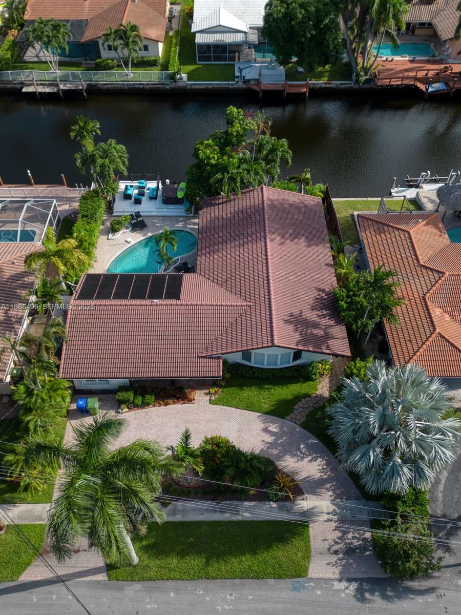 5830 Northeast 14th Road Fort Lauderdale, FL 33334 - Photo 42 of 46 an aerial view of a house with a lake view