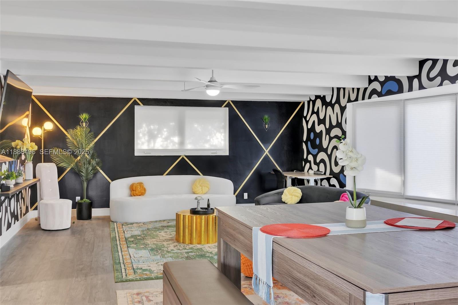 5830 Northeast 14th Road Fort Lauderdale, FL 33334 - Photo 9 of 46 a workspace with furniture and rug