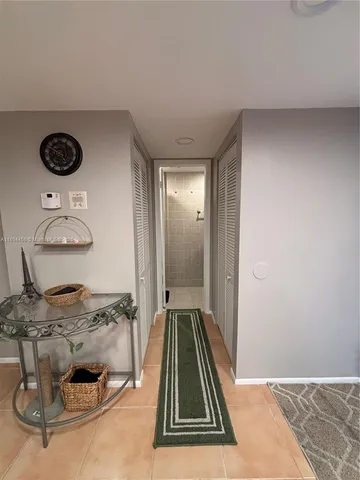 a bathroom with a double vanity sink and mirror