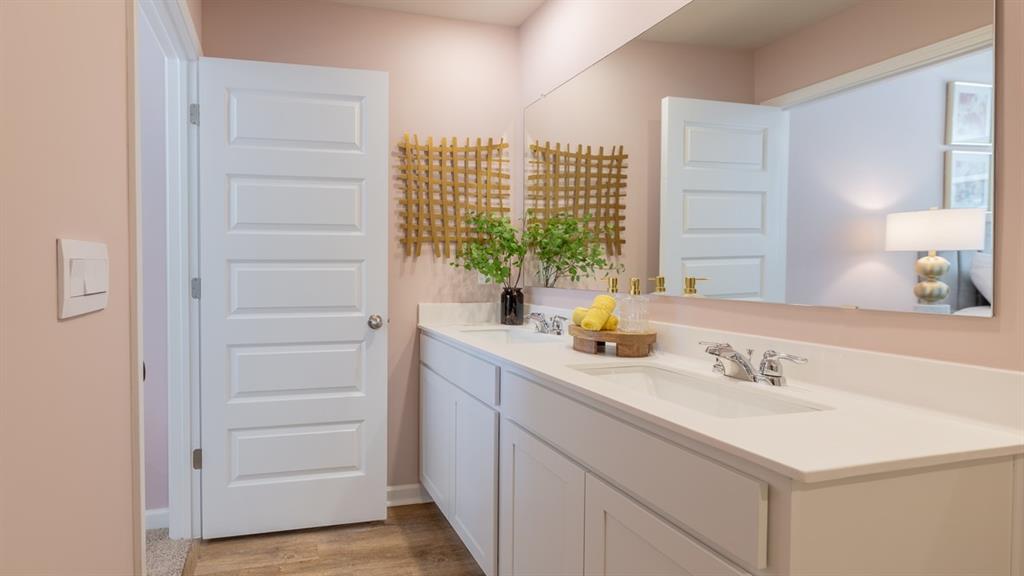 2078 Moss Hill Road Stone Mountain, GA 30083 - Photo 27 of 37 a bathroom with a sink and a mirror