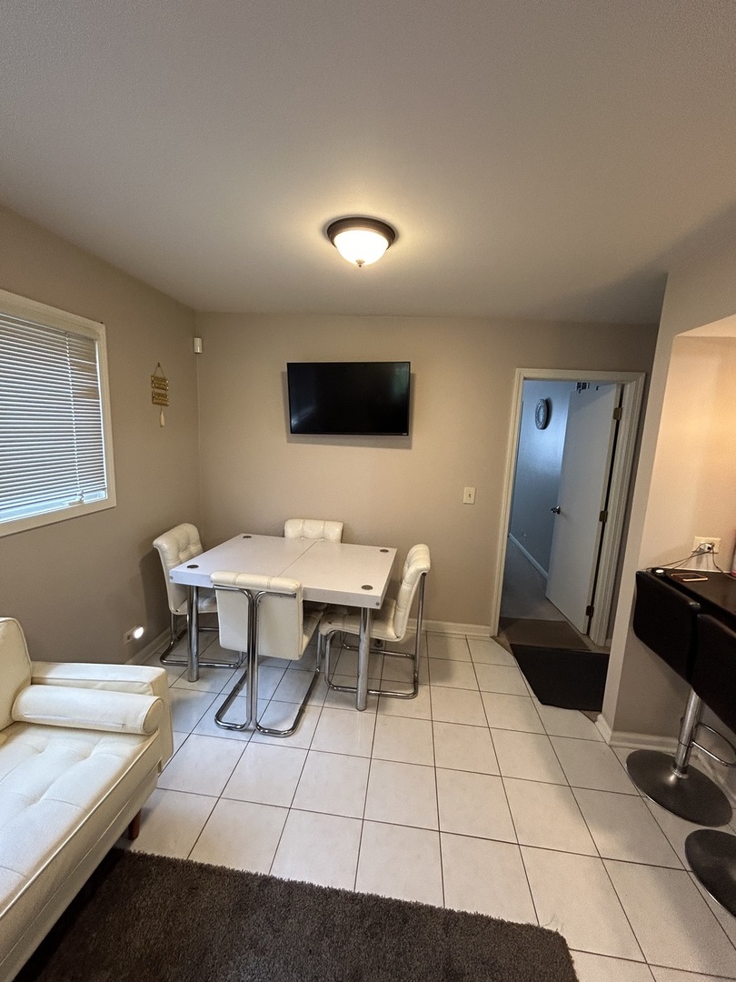 209 East Irving Park Road, Unit 1N Itasca, IL 60143 - Photo 18 of 30 a view of a workspace with furniture