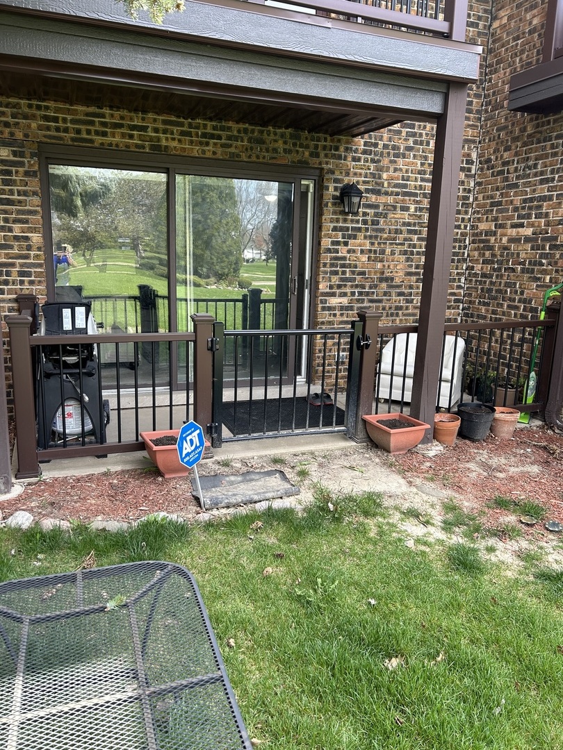 209 East Irving Park Road, Unit 1N Itasca, IL 60143 - Photo 9 of 30 a view of outdoor space yard and patio