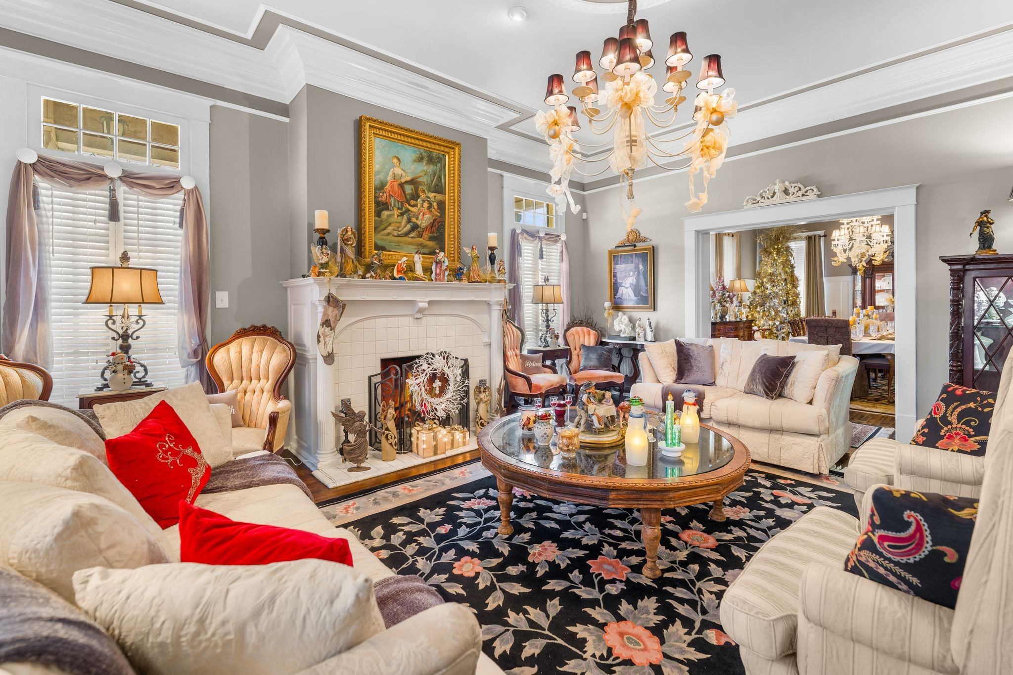 564 East Main Street Jackson, TN 38301 - Photo 12 of 54 a living room with furniture a chandelier and a fireplace