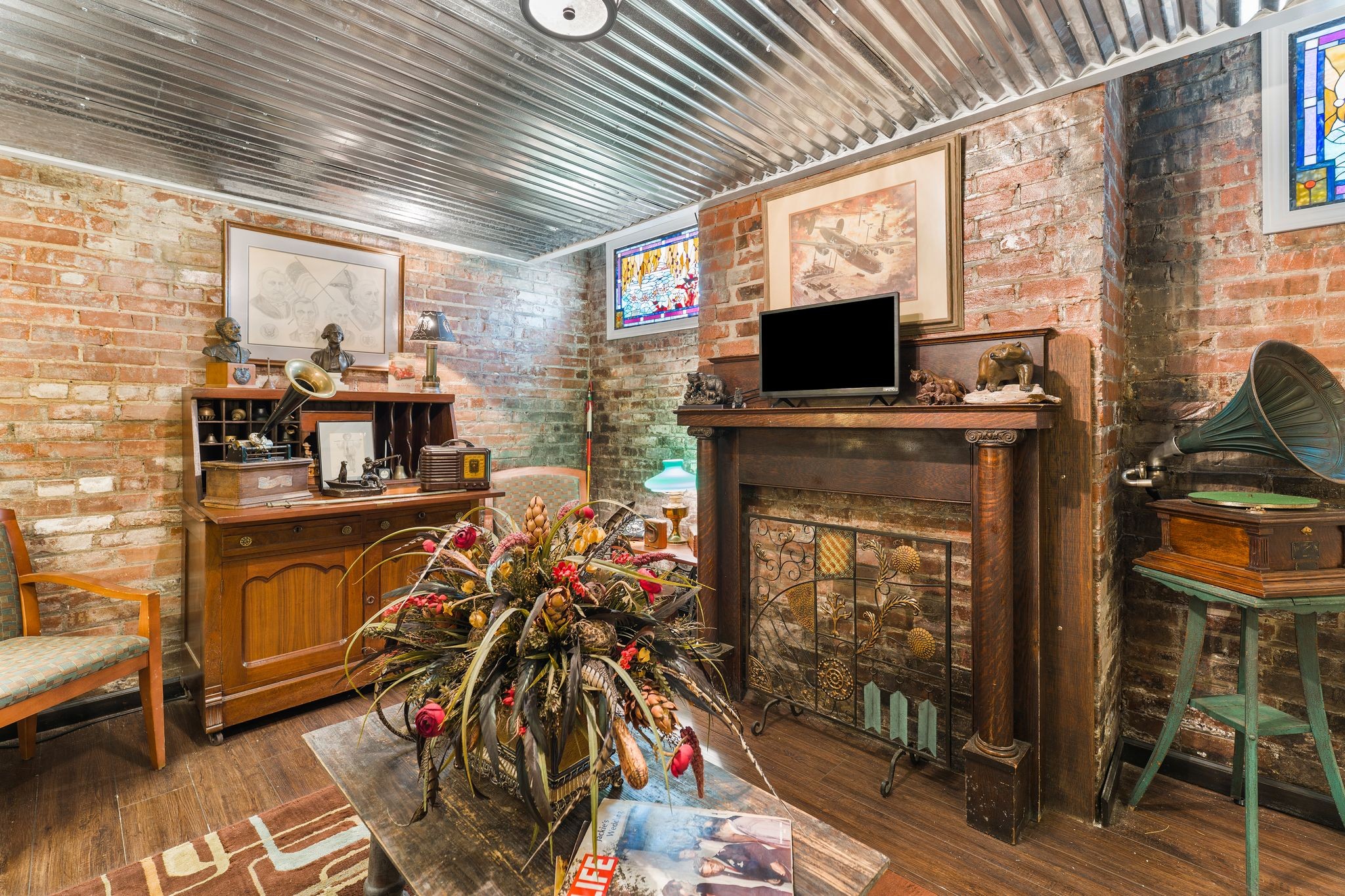 564 East Main Street Jackson, TN 38301 - Photo 21 of 54 a living room with fireplace furniture and a flat screen tv