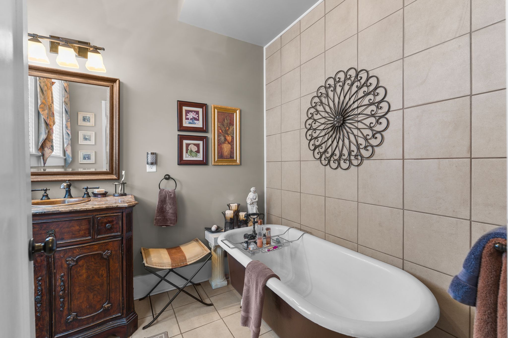 564 East Main Street Jackson, TN 38301 - Photo 25 of 54 a bathroom with a sink a toilet and mirror