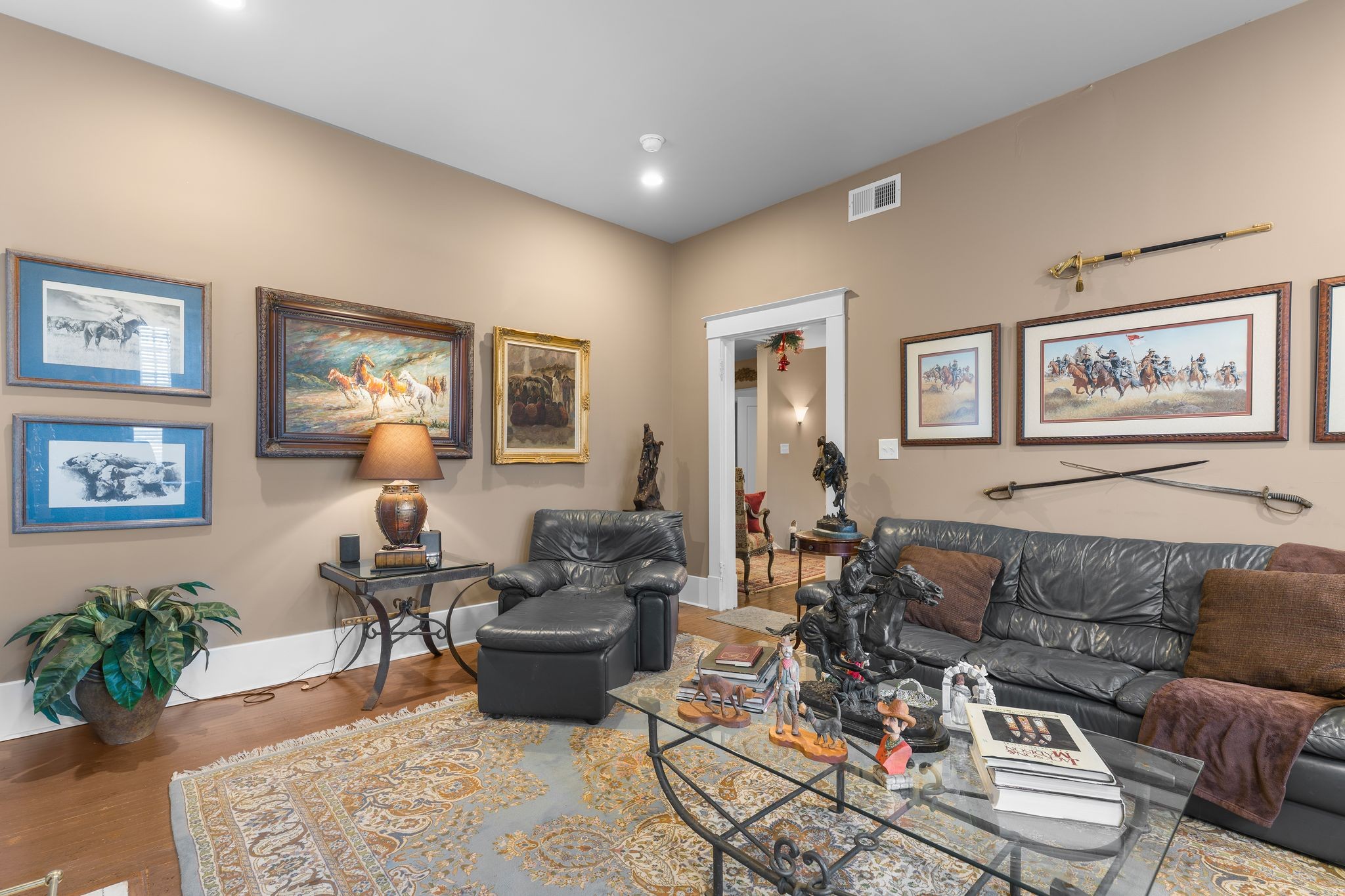 564 East Main Street Jackson, TN 38301 - Photo 27 of 54 a living room with furniture or couch and a potted plant