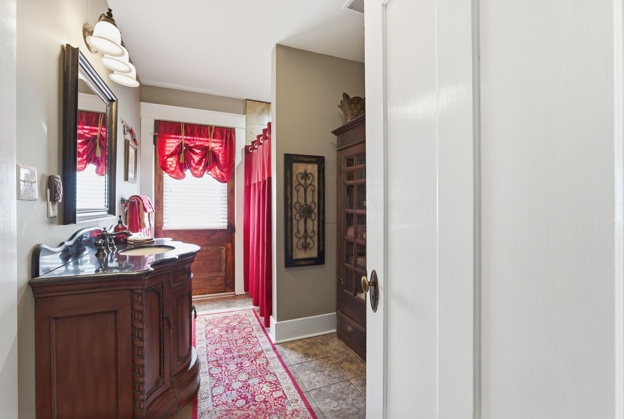 564 East Main Street Jackson, TN 38301 - Photo 29 of 54 a very nice looking room with a storage