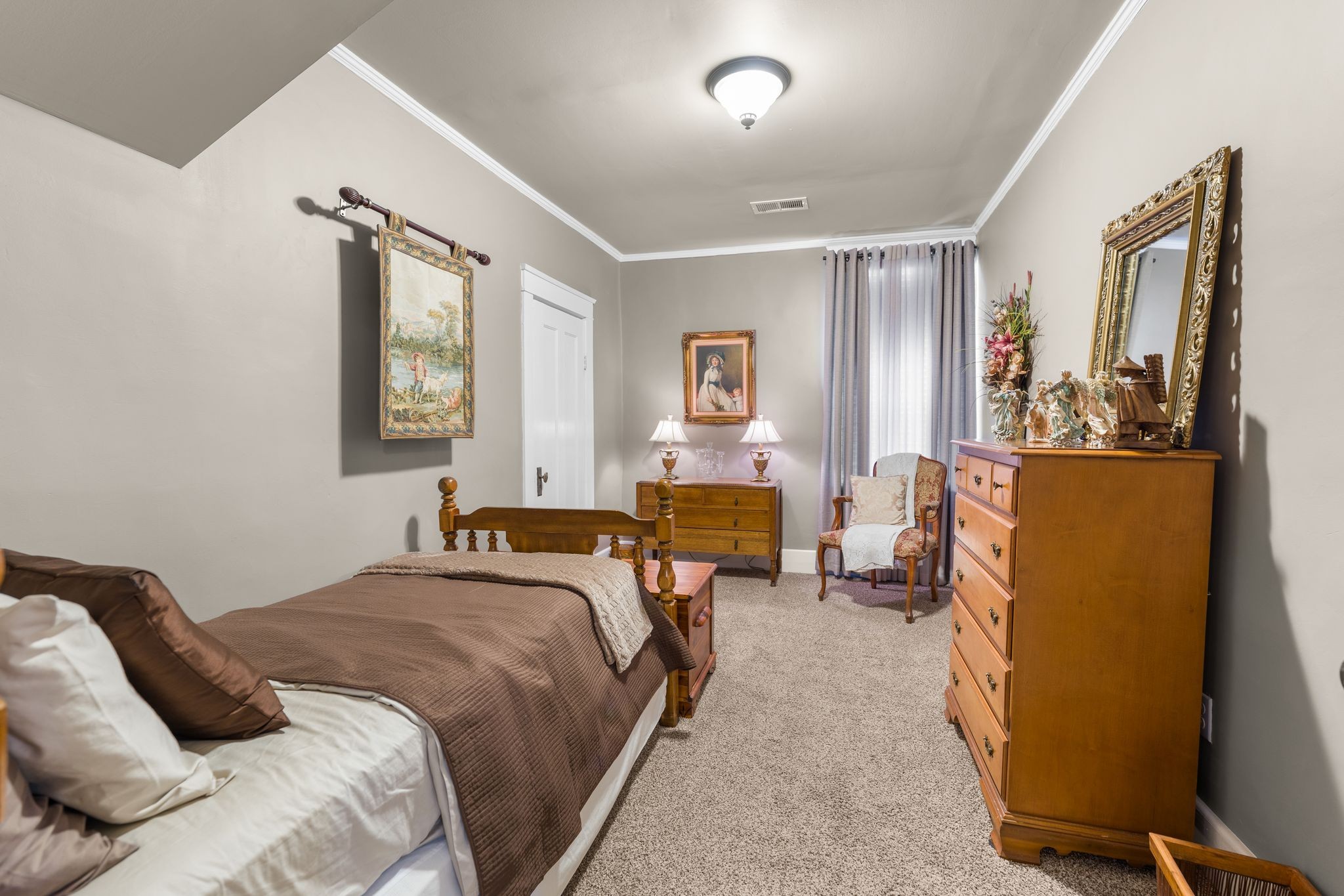 564 East Main Street Jackson, TN 38301 - Photo 34 of 54 a bedroom with bed and a furniture