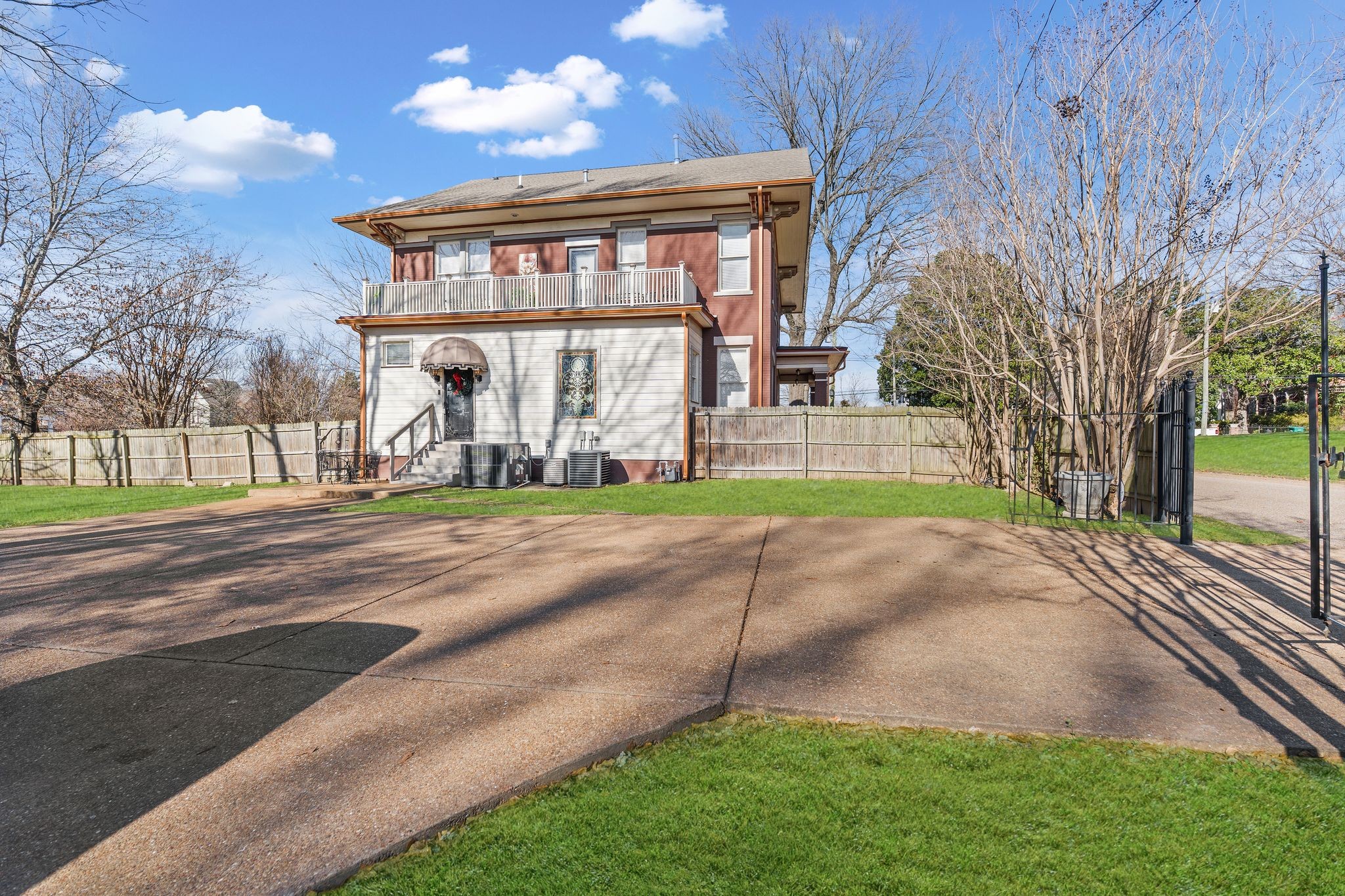 564 East Main Street Jackson, TN 38301 - Photo 43 of 54 a front view of a house with a yard