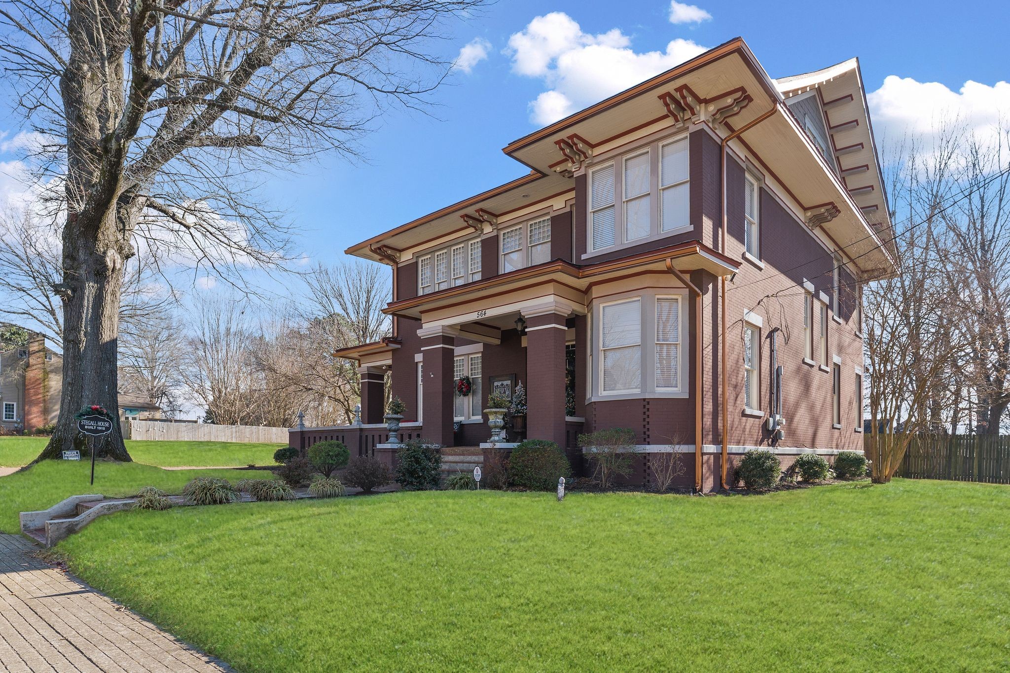 564 East Main Street Jackson, TN 38301 - Photo 5 of 54 a view of a building with a yard