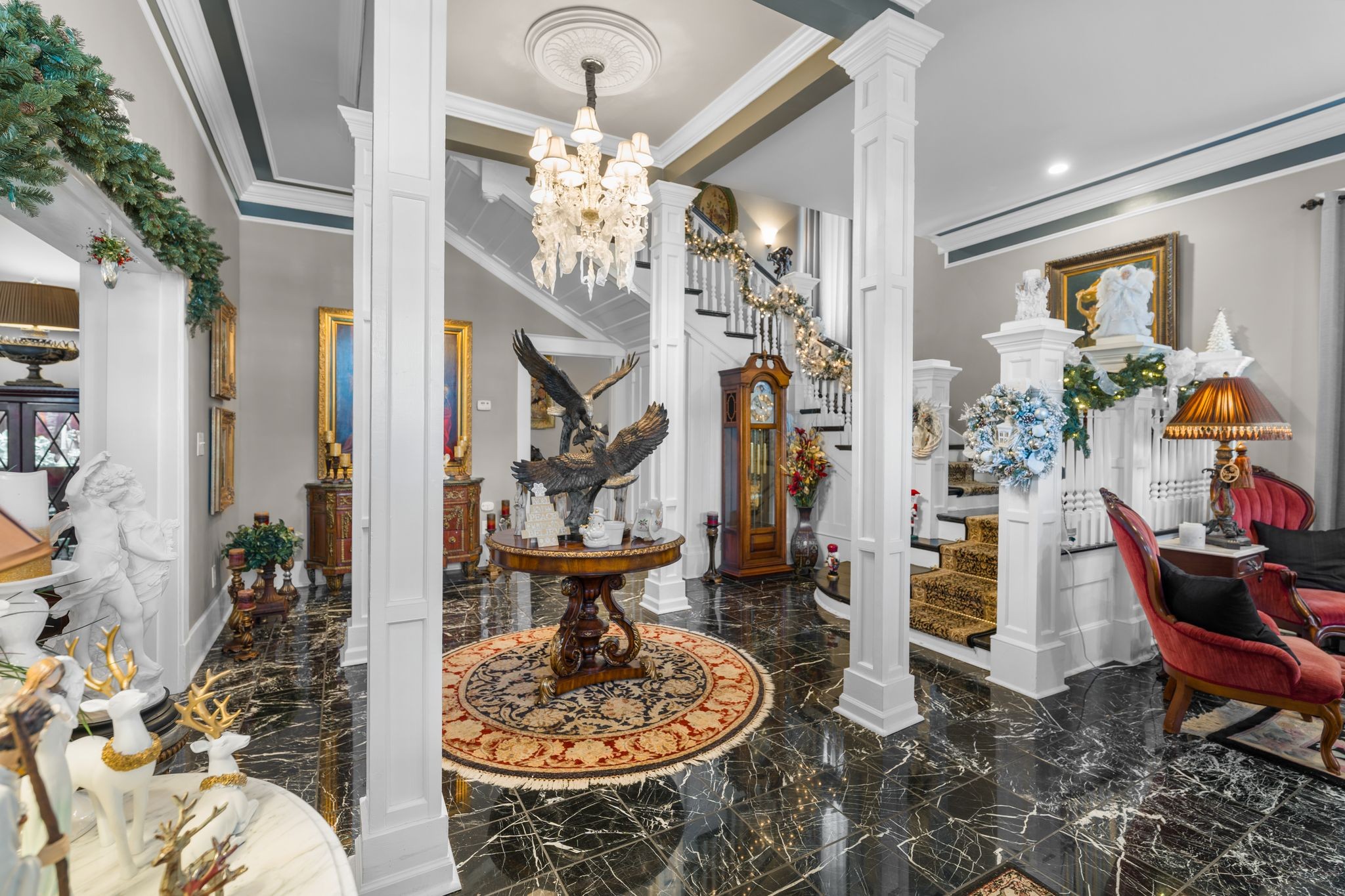 564 East Main Street Jackson, TN 38301 - Photo 7 of 54 a living room with furniture and a chandelier