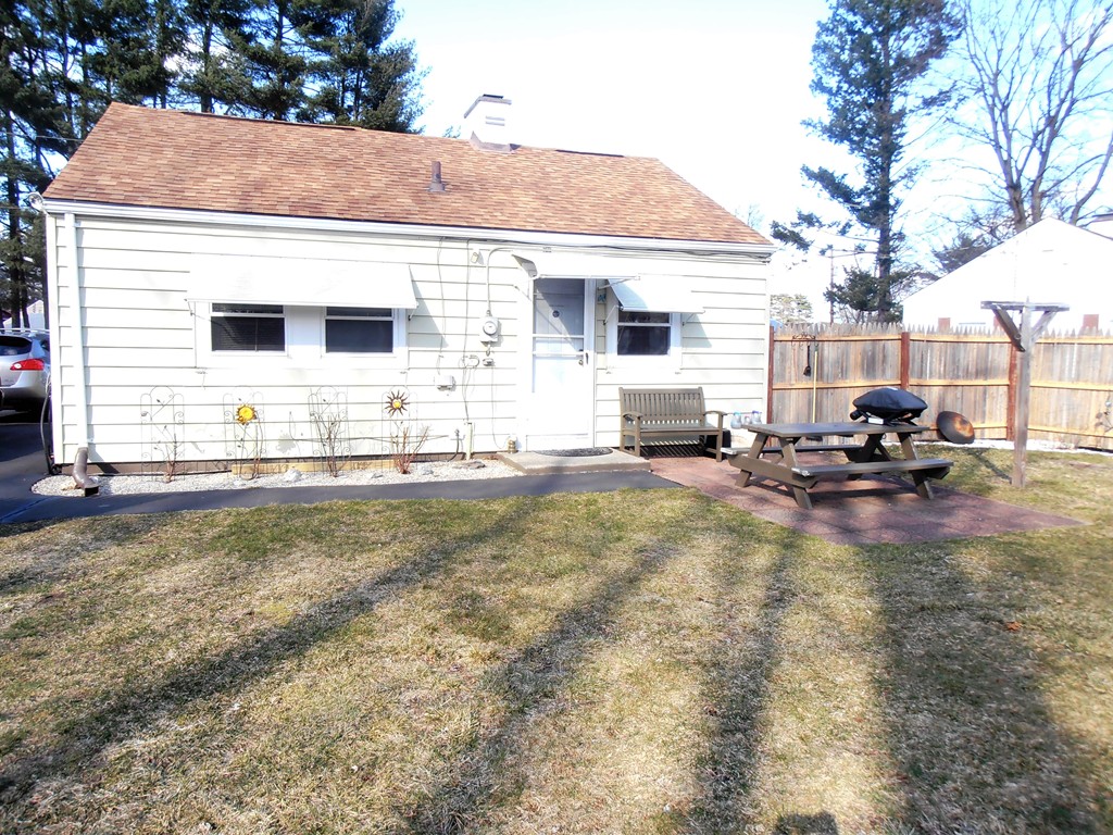 57 Ramah Street Springfield, MA 01104 - Photo 16 of 17 a view of a house with a back yard