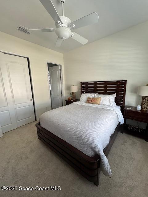 2115 Trift Bridge Circle Melbourne, FL 32940 - Photo 15 of 34 a bedroom with a bed and a mirror