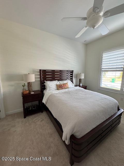 2115 Trift Bridge Circle Melbourne, FL 32940 - Photo 16 of 34 a bed sitting in a bedroom next to a window