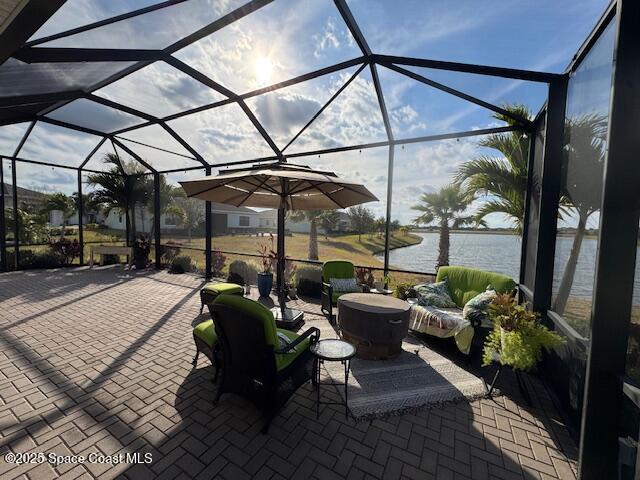 2115 Trift Bridge Circle Melbourne, FL 32940 - Photo 21 of 34 a sitting area with glass top table and chairs