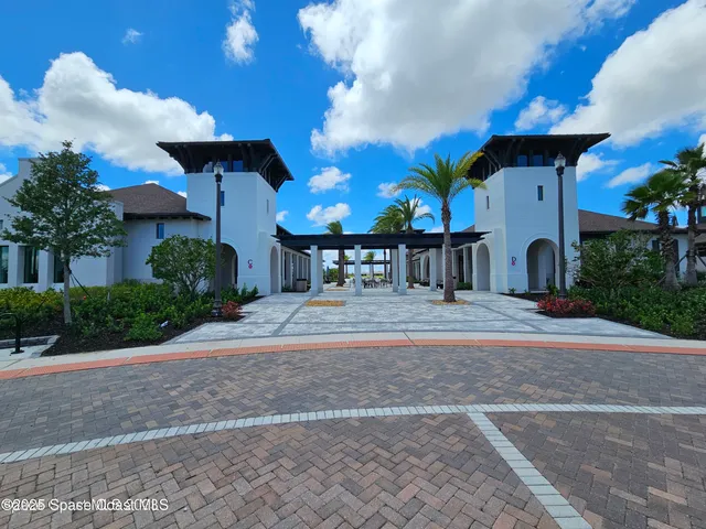 a view of swimming pool with seating space
