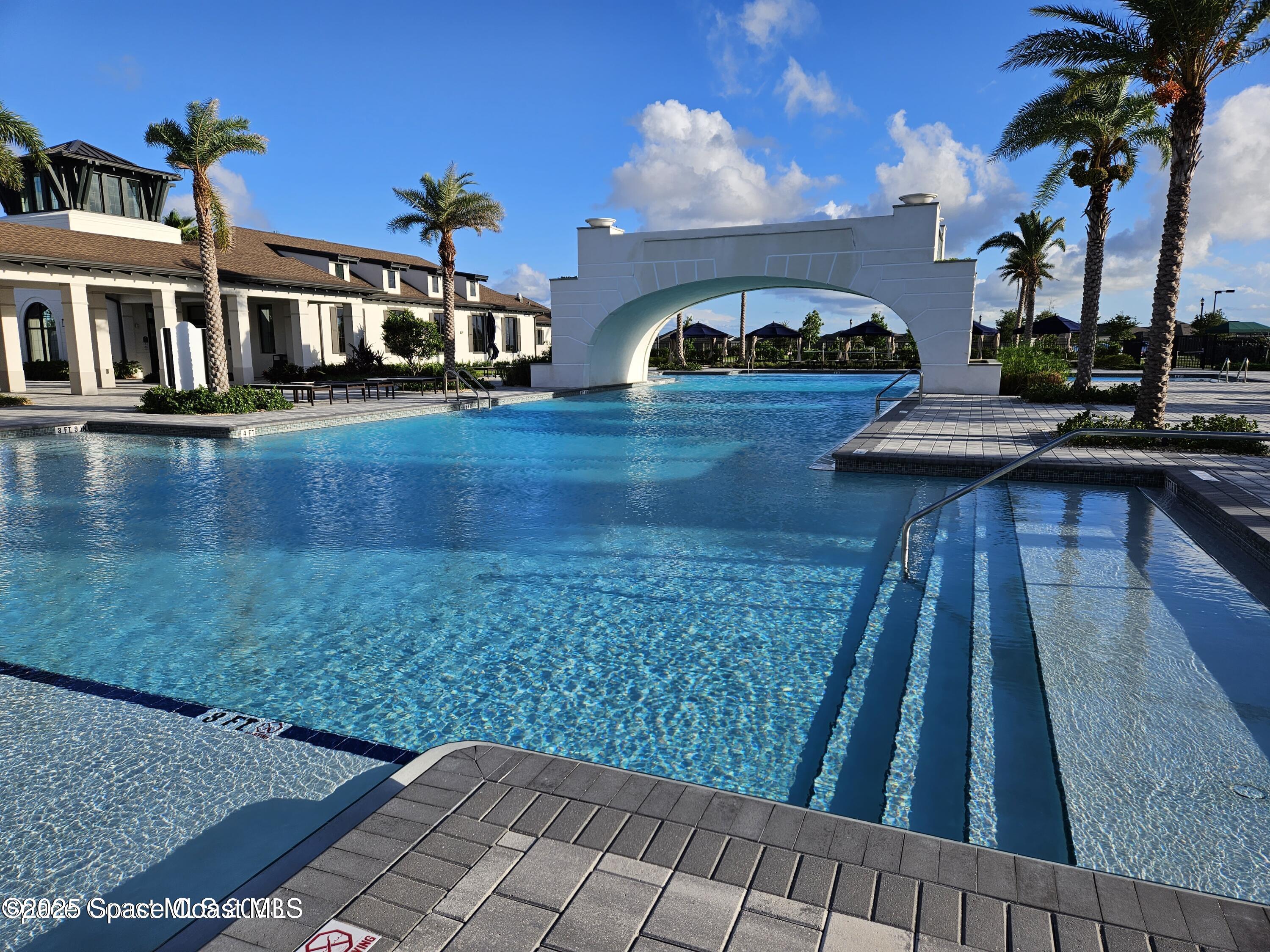 2115 Trift Bridge Circle Melbourne, FL 32940 - Photo 28 of 34 a view of swimming pool with seating space