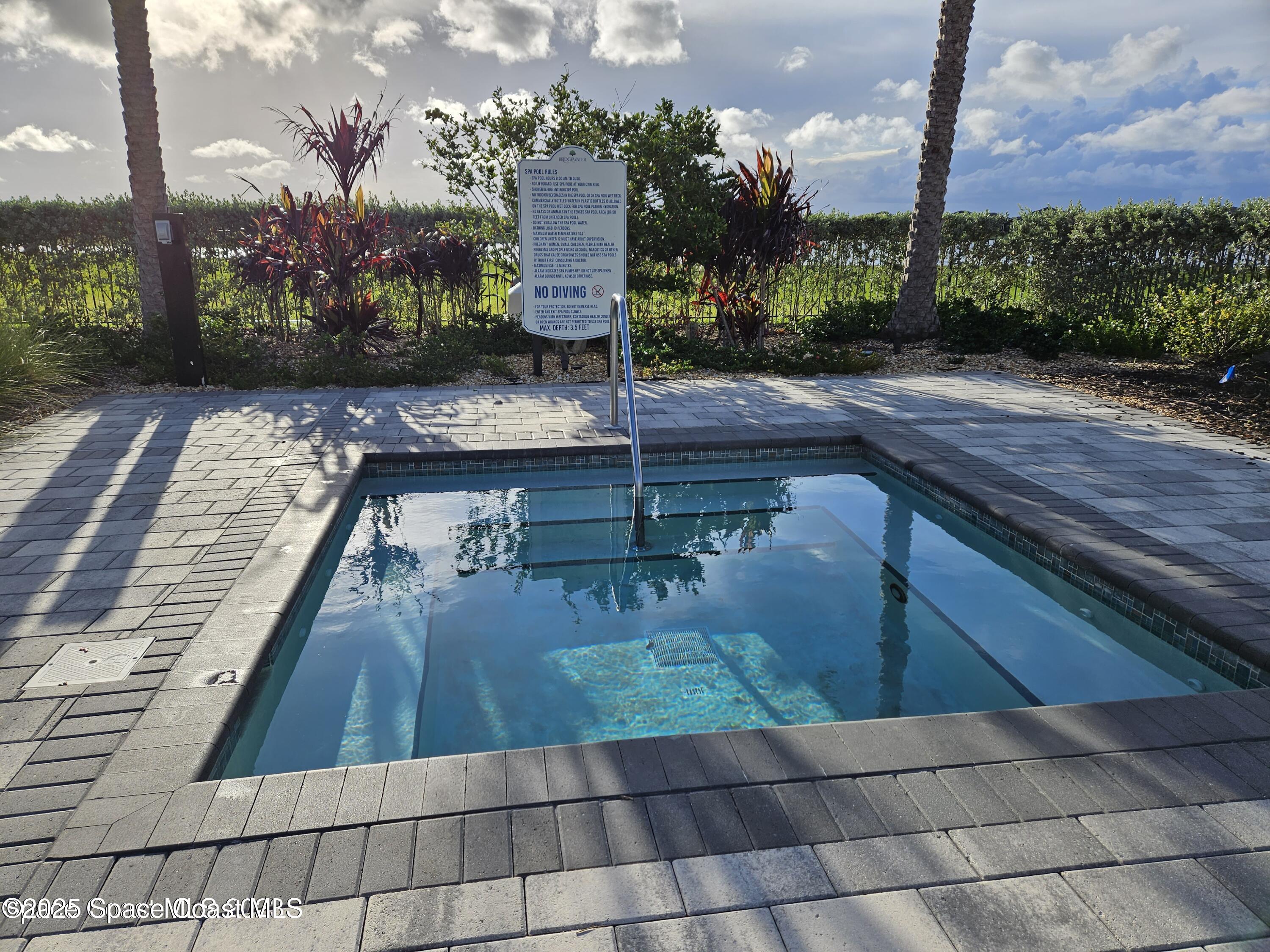 2115 Trift Bridge Circle Melbourne, FL 32940 - Photo 29 of 34 a view of a backyard with sitting area