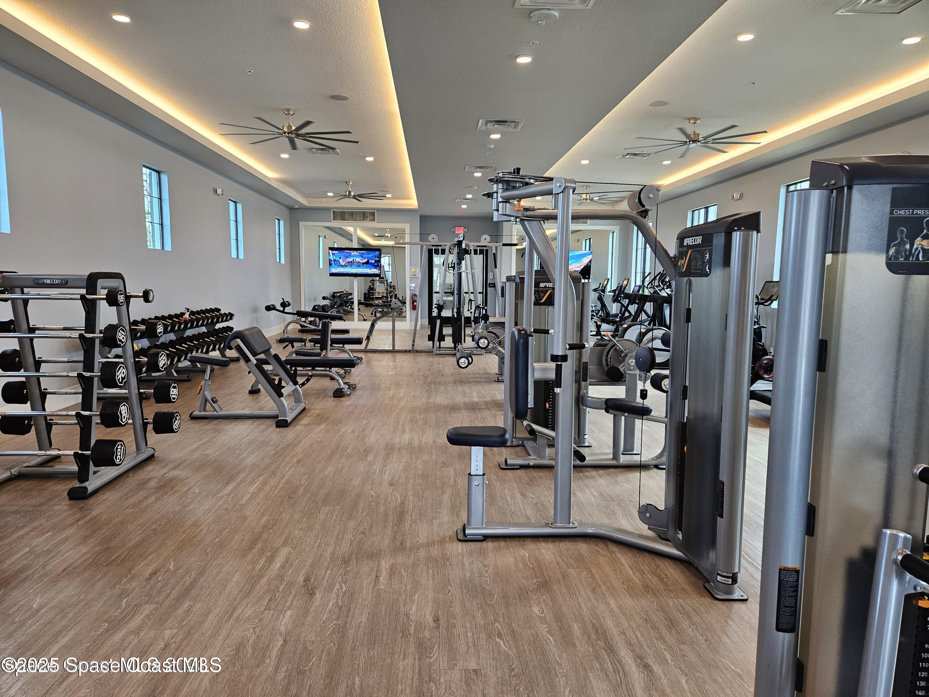 2115 Trift Bridge Circle Melbourne, FL 32940 - Photo 31 of 34 a view of a room with gym equipment