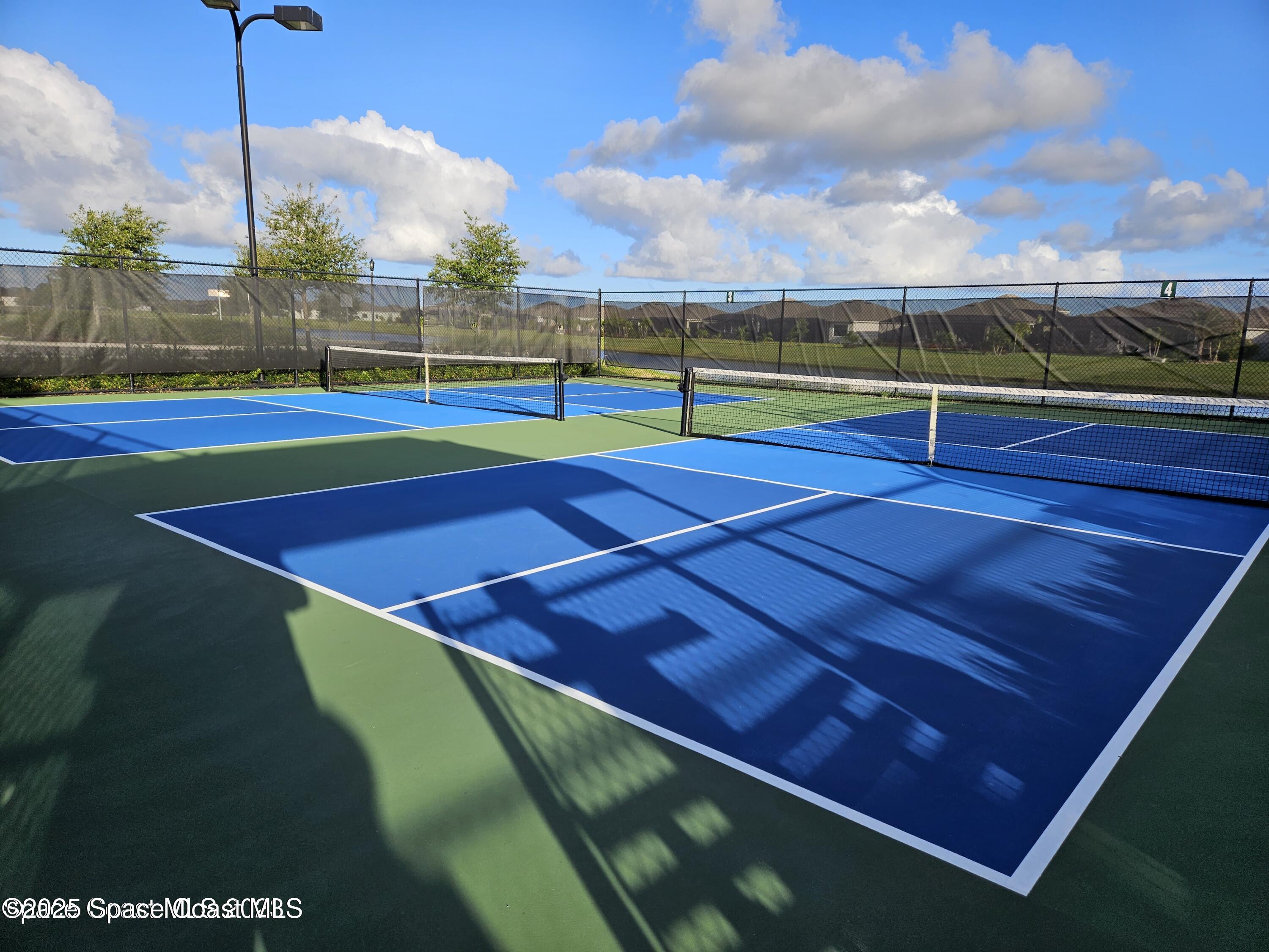 2115 Trift Bridge Circle Melbourne, FL 32940 - Photo 32 of 34 a view of a tennis court