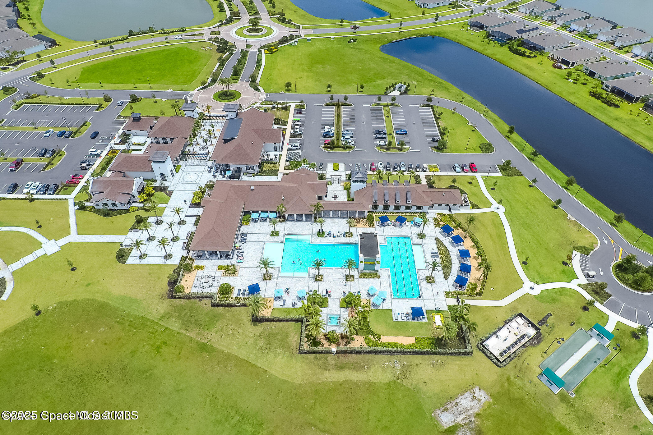 2115 Trift Bridge Circle Melbourne, FL 32940 - Photo 34 of 34 an aerial view of a swimming pool