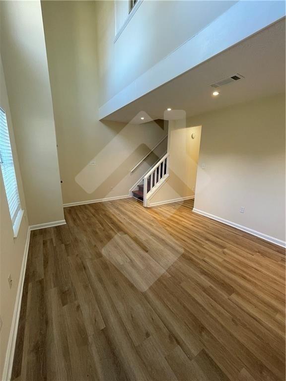 4267 Grogan Street Acworth, GA 30101 - Photo 5 of 37 a view of a hallway with wooden floor