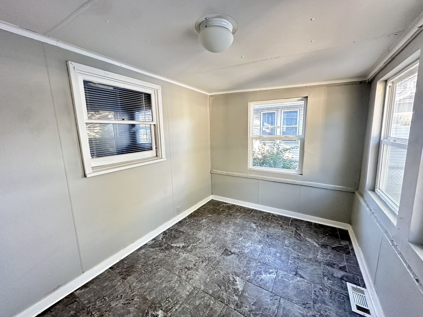 1061 Cottage Place Joliet, IL 60436 - Photo 14 of 21 a view of an empty room with a window