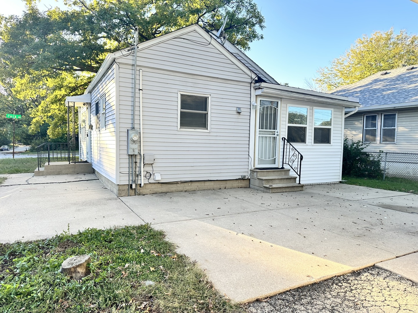 1061 Cottage Place Joliet, IL 60436 - Photo 21 of 21 a view of a house with a yard