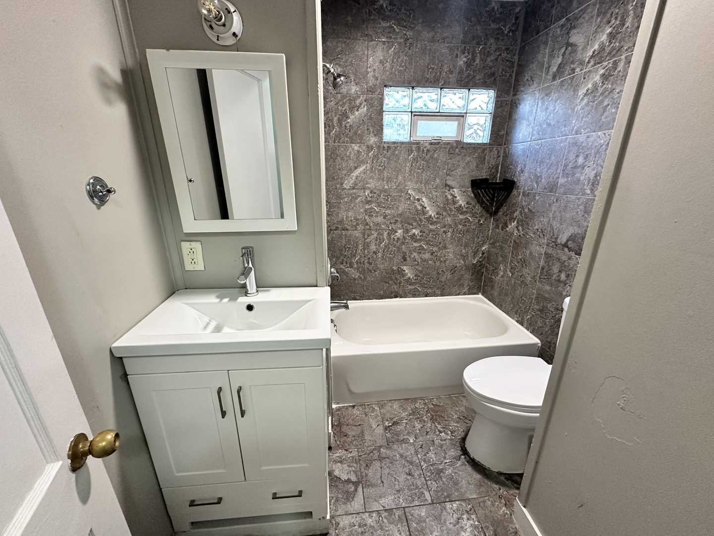 1061 Cottage Place Joliet, IL 60436 - Photo 7 of 21 a bathroom with a sink toilet a mirror and shower