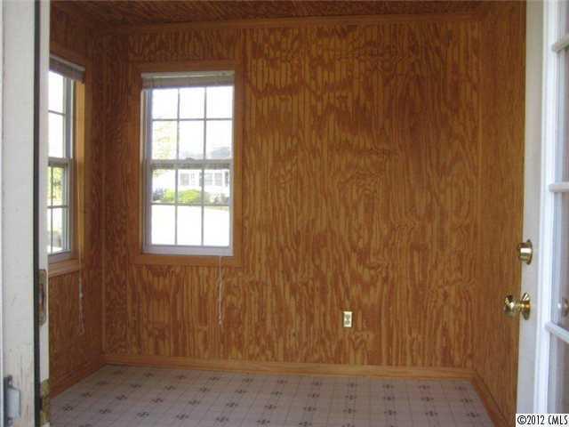 2101 Eaton Road Charlotte, NC 28205 - Photo 6 of 13 an empty room with windows