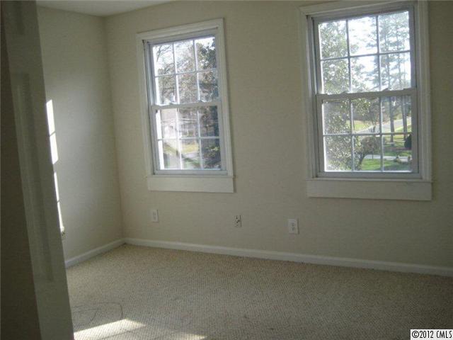 2101 Eaton Road Charlotte, NC 28205 - Photo 9 of 13 an empty room with a window