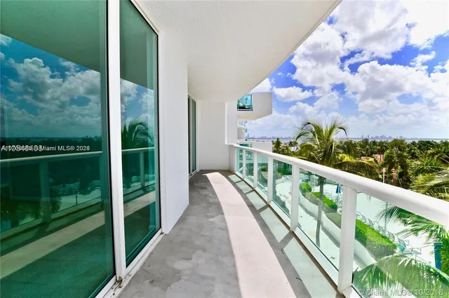 a balcony with wooden floor